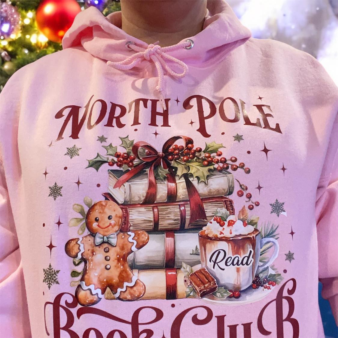 hoodie rose pâle north pole book club